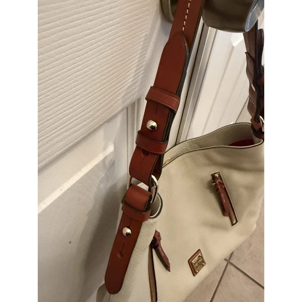 Dooney & Bourke Hobo Bag Women Large Cream Pebbled Leather Tan Trim Logo Plaque